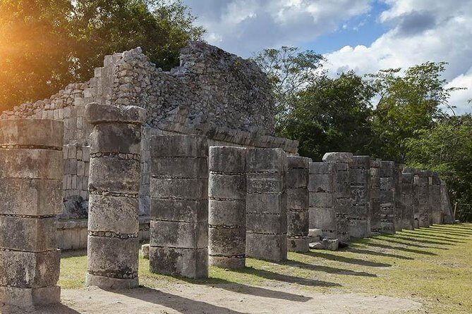Deluxe adventure! 2 Sacred Cenotes, Chichen Itza and Valladolid from Tulum City - Valladolid: stone center, quick swim, and a buffet window