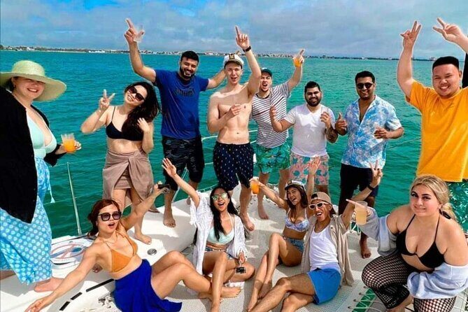 Deluxe Catamaran to Isla Mujeres, with Drinks, Snorkel & Buffet - Snorkeling with certified guides: what you’re actually paying for