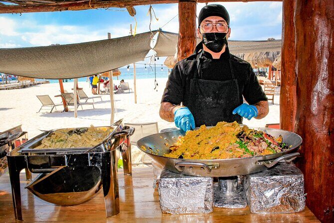 Discover Isla Mujeres: Catamaran, Snorkeling, and "Ice Bar" - Food and drinks: included buffet plus the open bar reality