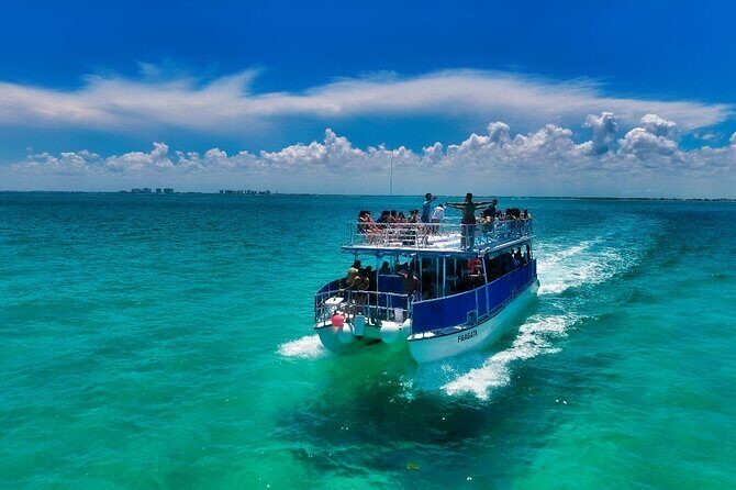 Discovering Isla Mujeres on a Double Decker Catamaran - Isla Mujeres Landing: Beach Club Lunch and Hammock Time