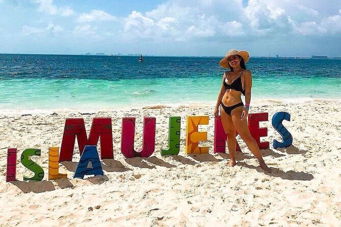 Exciting Catamaran Tour to Isla Mujeres, from Cancún! - Beach Club Lunch and the Ice Bar Add-On