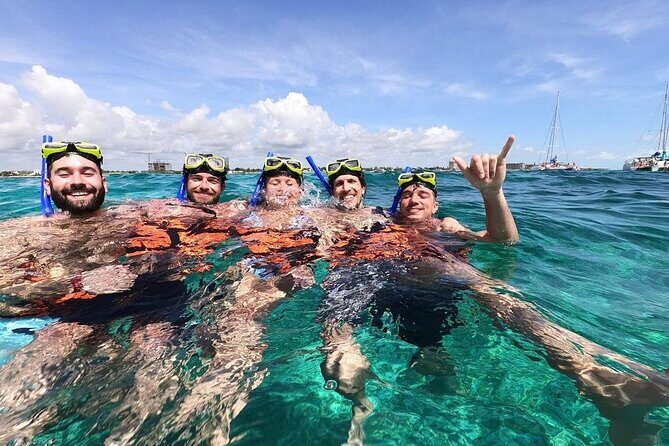 Exciting Speedboat & Snorkeling Tour in Cancun Lagoon! - Driving the speedboat: fun for couples, families, and groups