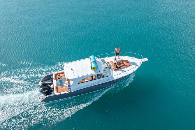 Exclusive Isla Mujeres and Cancun Private Yacht Tour - Getting there: Marina Bartolomé and pickup choices