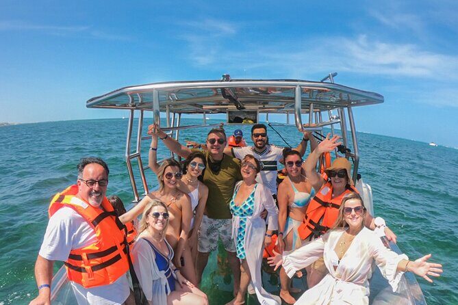 Excursion to Reefs in a transparent boat from Cancun - What you’ll see under the clear hull (and how to spot it fast)
