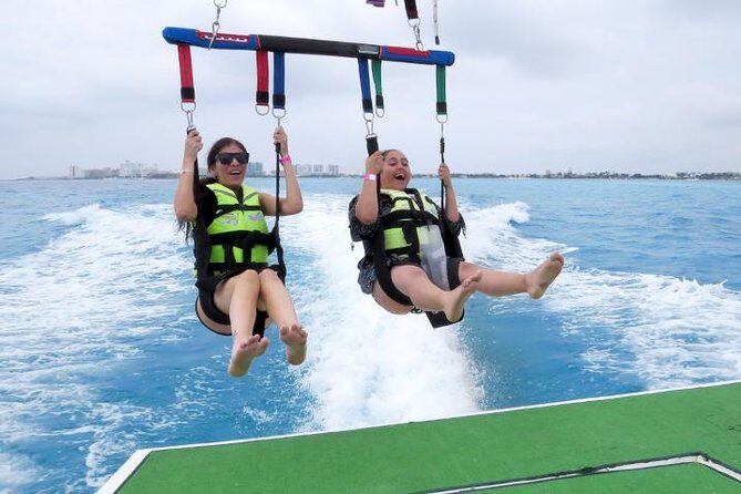 Fly Above Cancun Bay: Parasailing Experience - Photos, video, and the splash-down towel trick