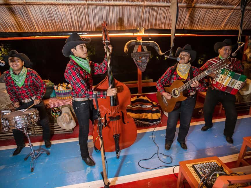 From Cancun: All-Inclusive Xoximilco Park Admission - The nighttime trajinera ride: the “Mexican canals” moment