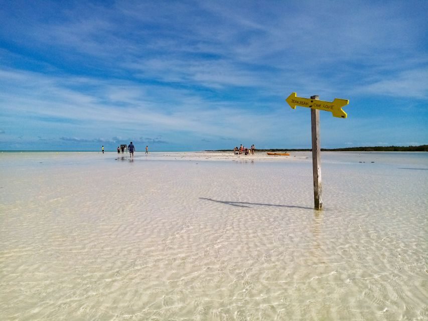 From Cancun or Puerto Morelos: Holbox Boat Tour with Lunch - Punta Mosquito and Secret Beach Sandbars: Photo Stops and Walking Free Time