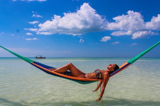 Full Day Holbox Island Tour from Playa del Carmen with Lunch - Holbox Island: lagoon boat ride, Yum Balam, and beach time