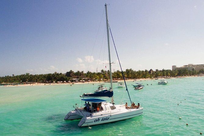 Full-Day Sailing Adventure to Isla Mujeres - Getting Picked Up and Finding the Catamaran