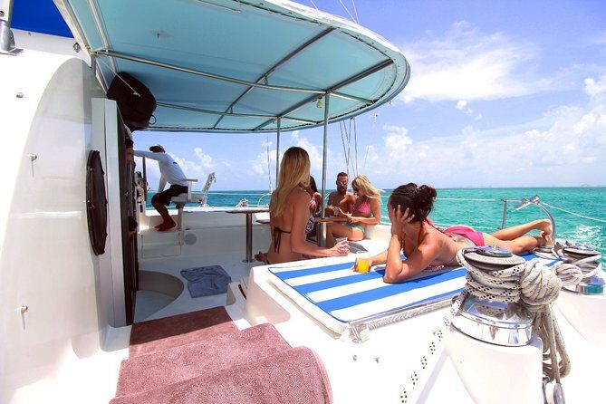 Full-Day Sailing Adventure to Isla Mujeres - The Isla Mujeres Stop: Beach Club Lunch and Pool Time