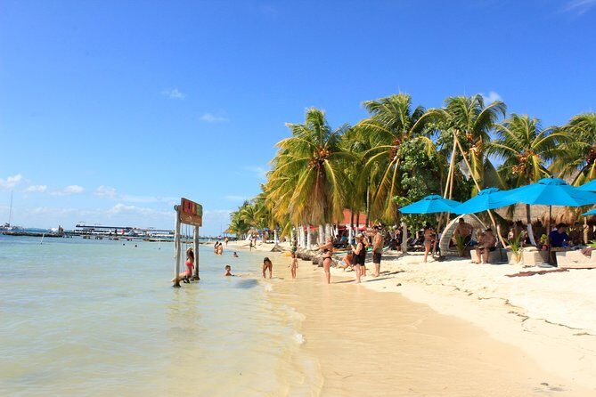 Full-Day Sailing Trip to Mujeres Island from Playa del Carmen - Snorkeling at Manchones reef: turtles, sculptures, and how long you’ll really be in