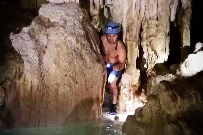Hidden Cenote exploration in Playa del Carmen - Caves and underground river walk: helmet, light, and the geology story
