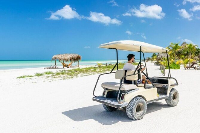 Holbox Island Tour Golf Cart Ferry with Lunch and Transportation - Key highlights at a glance