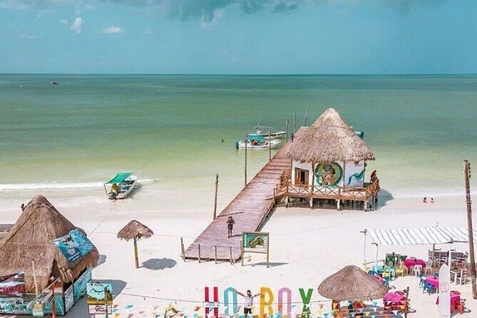Holbox Island Tour Golf Cart Ferry with Lunch and Transportation - Punta Mosquito: sea-only access and flamingo odds