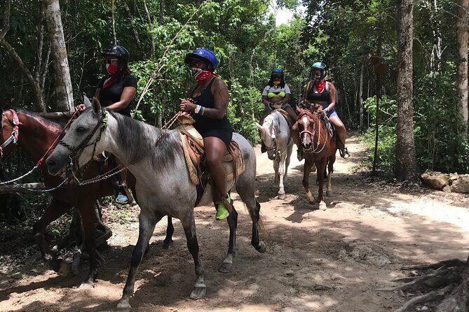 Horseback riding with ATV, zip lines and cenote, lunch and transfer - Zip lines first: safety gear and a sky-feeling start