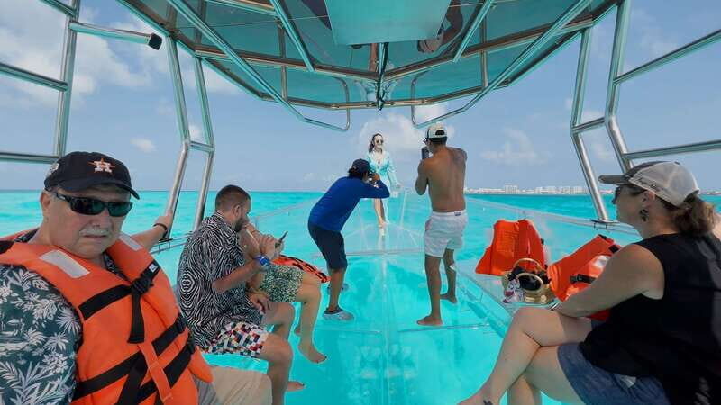 Isla Mujeres: 100% Transparent boat ride - Why a transparent boat in Isla Mujeres beats regular reef time