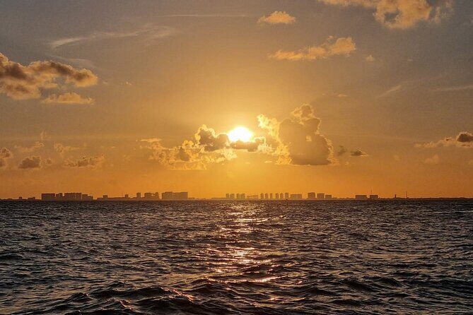 Isla Mujeres, Cancún Private Sunset Trip - North Beach sunset and the fun extras that can appear