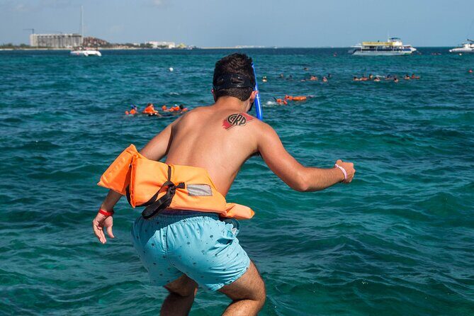 Isla Mujeres Catamaran from Cancun with Open bar and lunch - Price Reality Check: $29 Base Plus Mandatory $45 Fees
