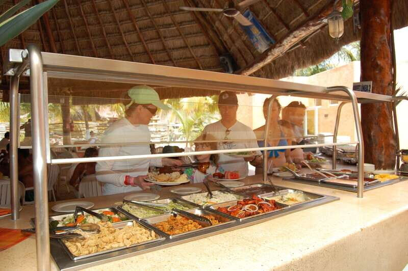 Isla Mujeres Catamaran, Snorkel & Buffet Lunch - Snorkeling over the coral reef: the included experience and the reef tax reality