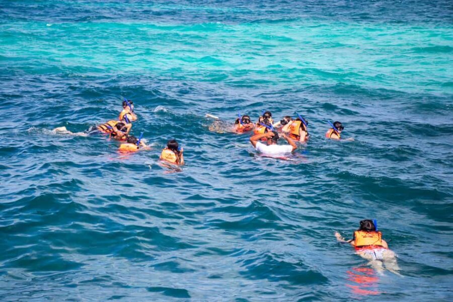 Isla Mujeres Catamaran, Snorkel & Buffet Lunch - Return to Cancun: music again, and why you might want a layer