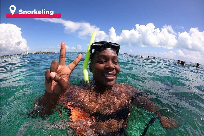 Isla Mujeres Catamaran + Snorkel + Open Bar on board + Buffet - Spinnaker flying and weather changes: fun when it works
