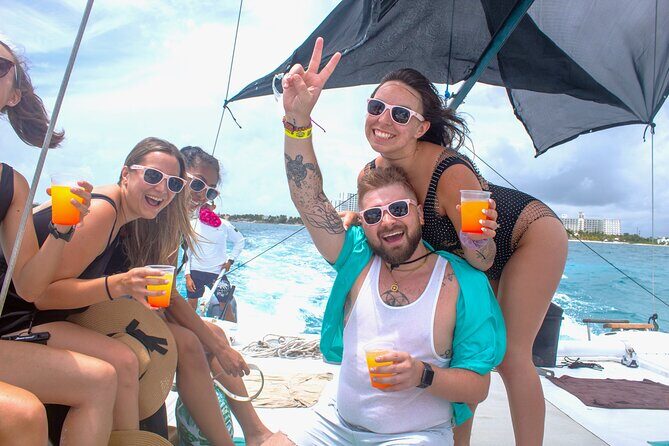Isla Mujeres Catamaran Tour from Cancun with Snorkel and Open Bar - Snorkeling in Isla Mujeres Waters: What’s Included and Who Should Skip It