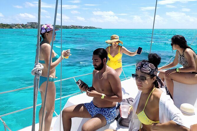 Isla Mujeres Catamaran Tour with Snorkeling at MUSA, Buffet Lunch & Open Bar - The crew matters more than you think
