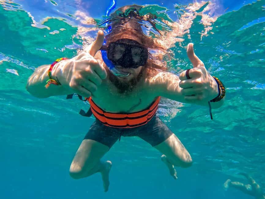 Isla Mujeres Catamaran Tour with Snorkeling & Open bar - Lunch and exploring Isla Mujeres: buffet fuel and shop time