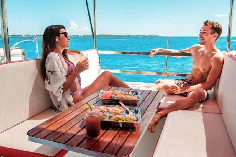 Isla Mujeres Plus Experience Catamaran Tour + Snorkel+Lunch - Isla Mujeres Free Time: Playa Norte, Town Strolls, and the Reality of Crowds