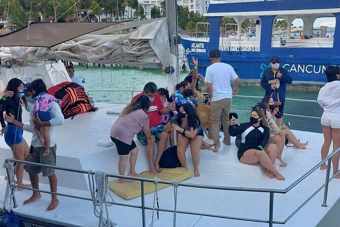 Isla Mujeres Premium Tour in Catamaran with Snorkel and Buffet - Snorkeling at Arrecife El Meco: Reef Sculptures and a Weather Reality Check