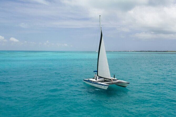 Isla Mujeres Premium Tour in Catamaran with Snorkel and Buffet - Playa Norte on Isla Mujeres: Swimming, Shops, and Two Hours to Wander