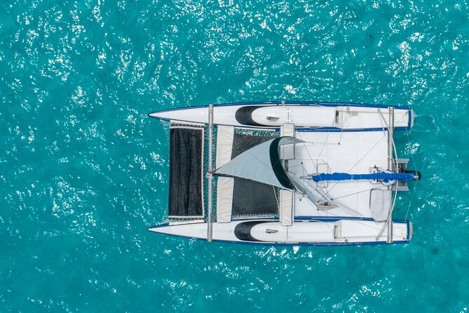 Isla Mujeres Premium Tour in Private Catamaran with Lunch - Stop 5: Isla Mujeres + the sunset sail back (spinnaker if wind allows)