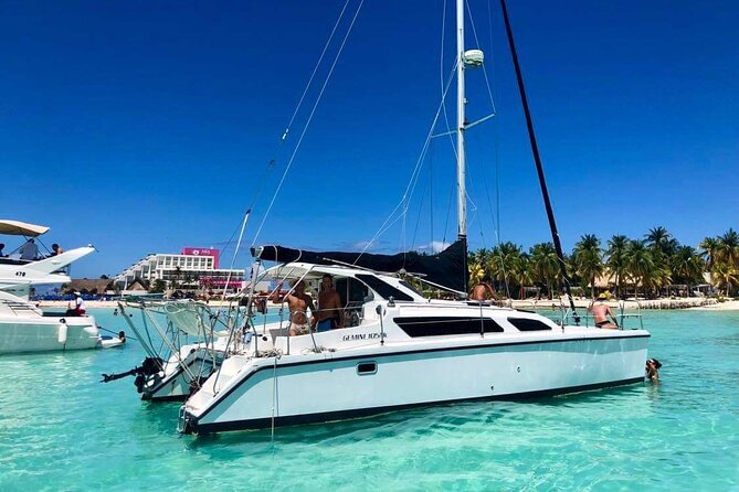 Isla Mujeres Private Catamaran, Cruising, Snorkeling having Fun!! - Stop 2: Kin Ha anchor break with music, cold drinks, and easy water time