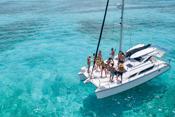 Isla Mujeres Private Catamaran, Cruising, Snorkeling having Fun!! - Stop 1: Isla Mujeres coastline + El Meco reef park snorkeling time