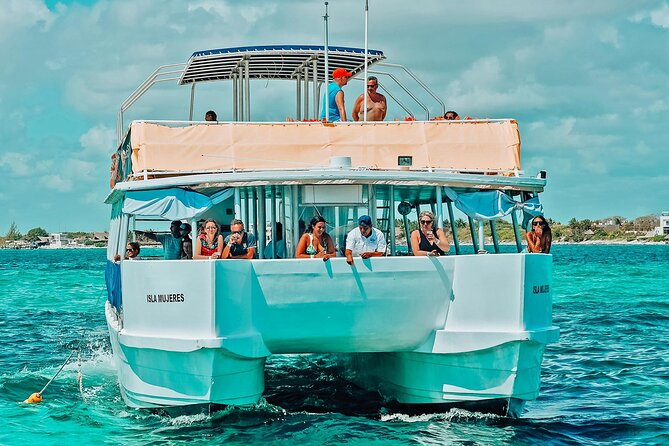 Isla Mujeres, Snorkel, Lunch & Pick Up from Cancun to P.Morelos - Isla Mujeres time: freestyle freedom vs guided all-inclusive flow