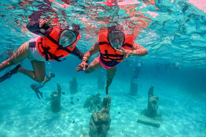 Isla Mujeres Spring Break Party Catamaran Snorkel and Open Bar - How the full day moves from Cancun to Isla Mujeres