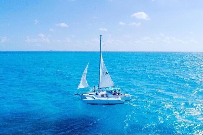 Isla Mujeres Tour in Private Catamaran with Snorkel and Lunch - Stop 1: Playa Tortugas check-in and itinerary walkthrough