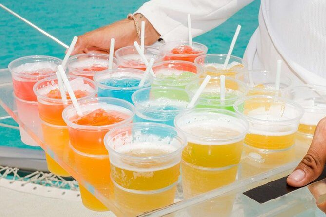 Isla Mujeres Tour on Catamaran with Snorkel, Open Bar, Buffet & Beach club - Beach Club Lunch and Open Bar: Where the Comfort Meets the Party