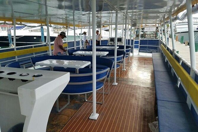 Isla Mujeres Unlimited Catamaran! Drinks, Fun & Party From Playa Del Carmen - On the water: open bar, music, and crew showmanship
