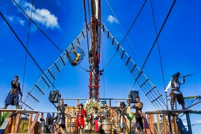 Jolly Roger Pirate Show and Dinner Cruise with Open Bar - Boarding the Jolly Roger: From Punta Sam to a sea-night schedule