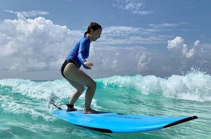 Learn to Surf in 1 Easy Lesson in Cancún - What You Get With the Lesson: Gear, Rash Guard, Shade, and Support