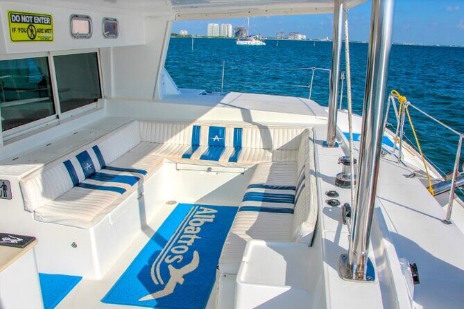 Luxury Catamaran Tour to Isla Mujeres with Transportation - Stop 4: Club Playa Mexico Beach Club With Buffet, Open Bar, and Water Toys