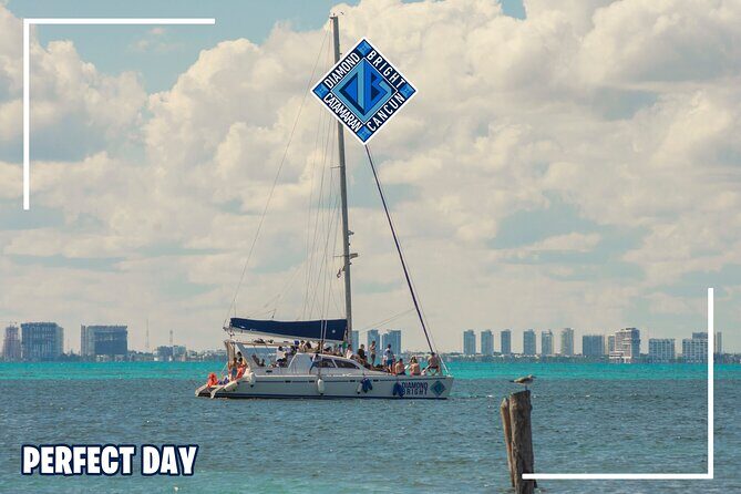Luxury Catamaran tour to isla mujeres with transportation from Tulum - Isla Mujeres by catamaran: beach club, lunch, and time in town