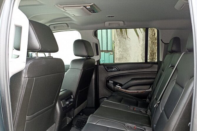 Luxury Private VIP Transportation from Cancun Airport - Vehicle, perks, and limits: A/C, drinks, luggage, and service hours