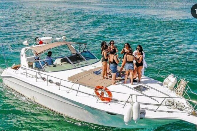 Luxury Private Yacht Rental by the Turquoise Waters of the Caribbean. - Isla Mujeres stop: 2 hours to mix beaches, reef views, and Caribbean town energy
