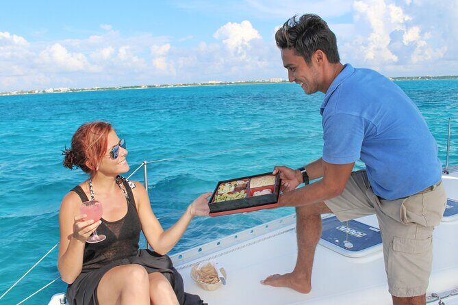 Luxury Sailing Experience to Isla Mujeres with Lunch & Open Bar - Practical packing tips for a smooth day on the water