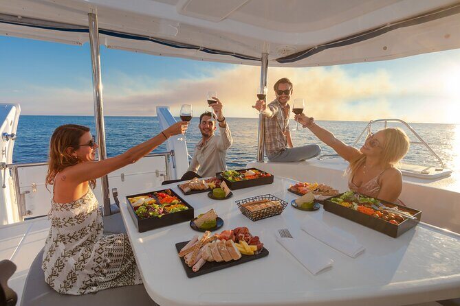 Luxury Sunset Cruise from Riviera Maya - Onboard vibe: crew energy, host moments, and shared-boat expectations