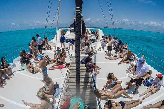 Mujeres Island Tour by Catamaran from Cancun City - Cancun departure logistics: Playa Langosta, pickup, and staying sane