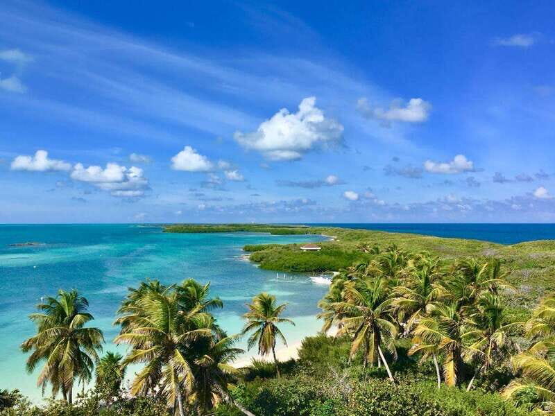 PARADISE ISLAND- ISLA CONTOY AND ISLA MUJERES - The hotel pickup and pier timing from Flamingos