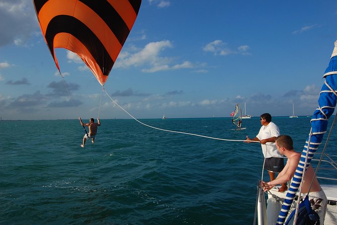Party On Sailing Cruise to Isla Mujeres from Cancun - Snorkeling at the Isla Mujeres reefs: gear included, but conditions decide the experience
